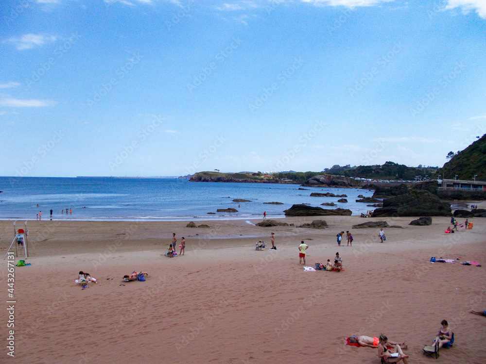 Costa de Candás on a day with blue skies and some clouds in the Principality of Asturias, Spain. Horizontal photography.