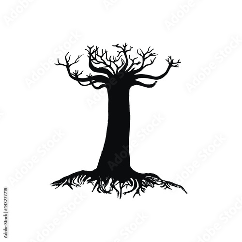 A black old dry tree without leaves. A mighty old tree with branches and roots. Centenarian tree logo