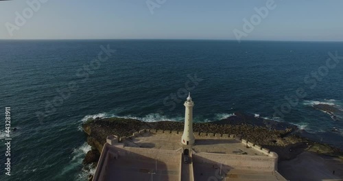 Casablanca morocco lighthouse atlantic ocean coast surfing. Aerial. High quality 4k footage