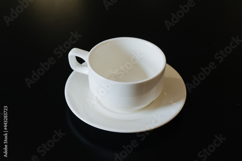 white porcelain cup and saucer for tea or coffee 