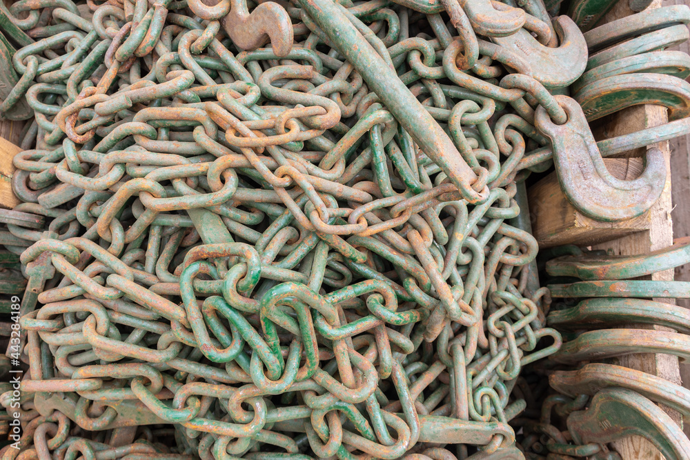 background of green rusty chains