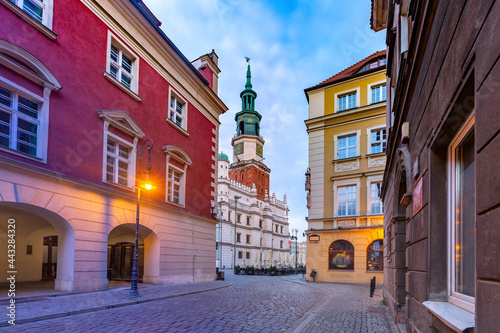 Empty street and Poznan Town Hall in Old Town at sunrise, Poznan, Poland