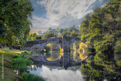 Puente romano de Allariz sobre el rio Arnoia photo