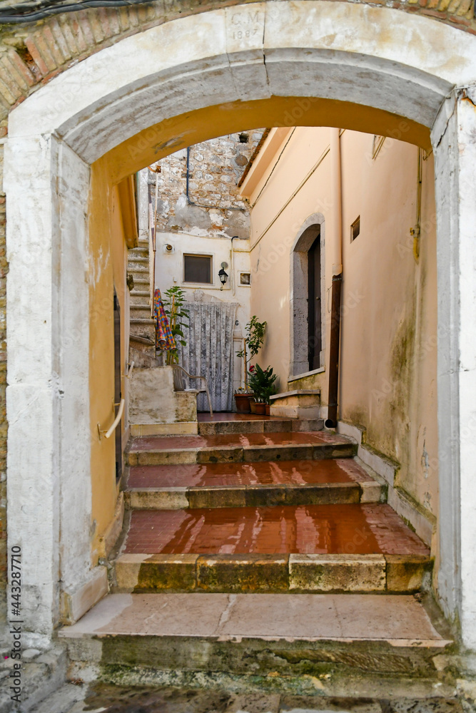Entrance arch in an old house in Sant'Agata di Puglia, a medieval village in southern Italy. Entrance arch in an old house in Sant'Agata di Puglia, a medieval village in southern Italy.
