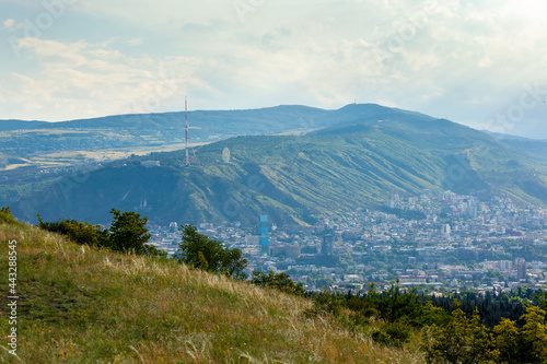 Beautiful view of Tbilisi at sunset, capital of Georgia © k_samurkas