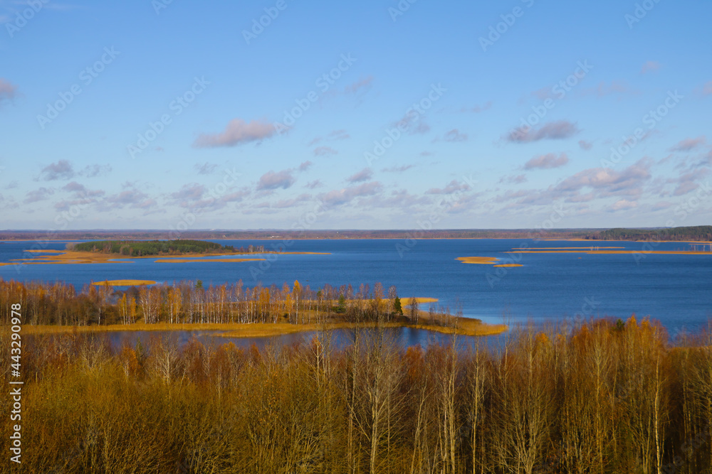 View from the top to a beautiful lake in autumn.