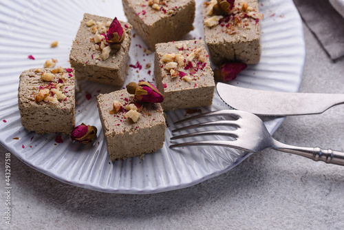 Halva with rose petal and nuts. photo