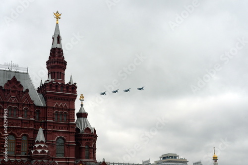 Photography A group of SU-35S multi-purpose fighters in the sky over Moscow's Red Square dur