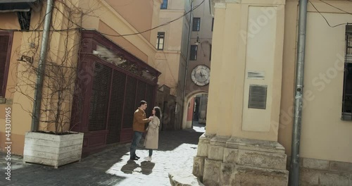 Wallpaper Mural Sweet couple have vacation in old european town. Happy young lovers enjoy time spending together Torontodigital.ca