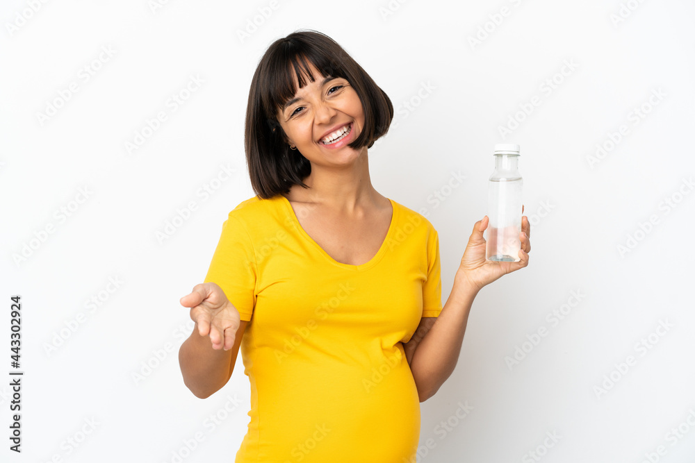 Young pregnant woman holding a bottle of water isolated on white background shaking hands for closing a good deal Young pregnant woman holding a bottle of water isolated on white background shaking hands for closing a good deal