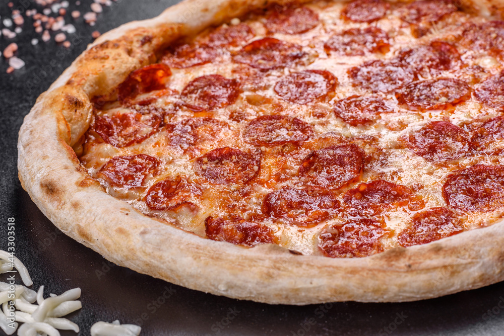 Pepperoni pizza with pizza sauce, mozzarella cheese and pepperoni Pepperoni pizza with pizza sauce, mozzarella cheese and pepperoni