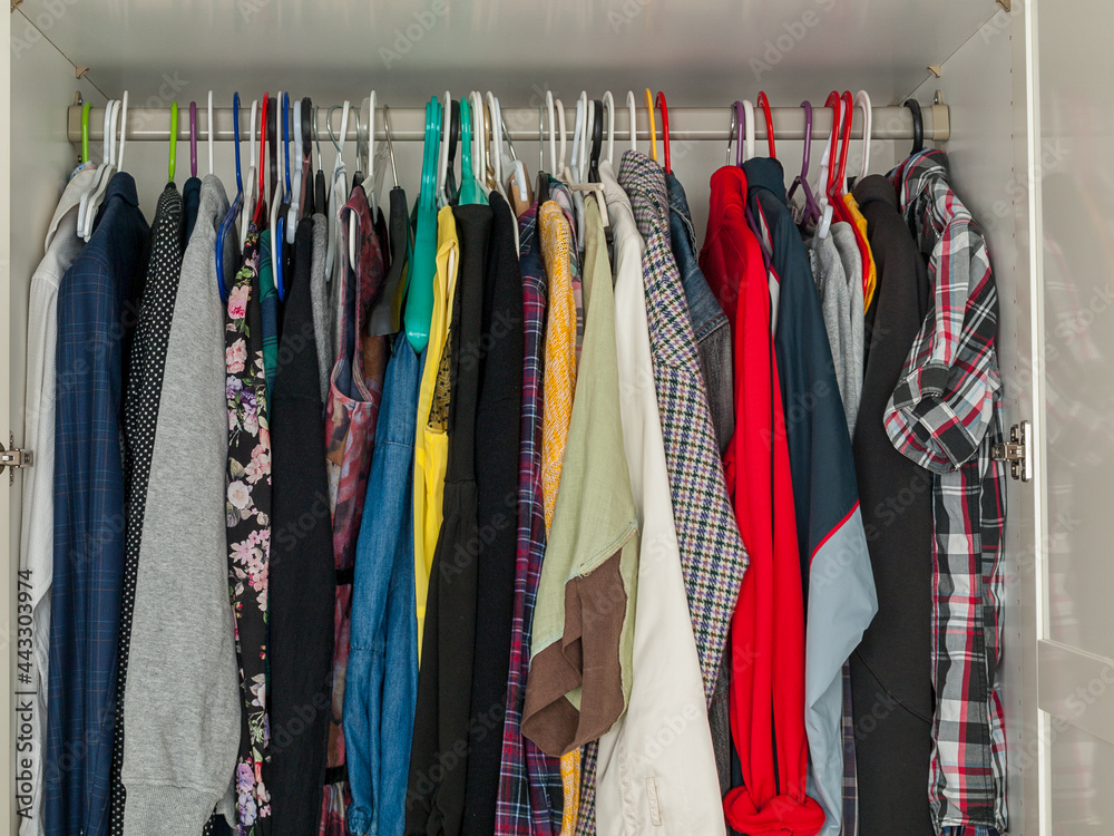 wardrobe with hanging clothes, filled wardrobe, storing clothes at home, saving space wardrobe with hanging clothes, filled wardrobe, storing clothes at home, saving space