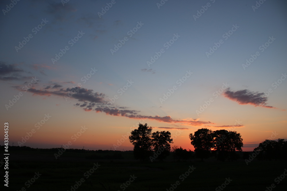 Sunset over polish fild. Poland.