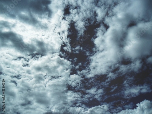 Clouds the sky metallic and darkened 