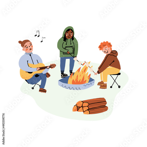 Outdoor pastime with friends, camping vacation set. Friends around a bonfire playing guitar, frying the marshmallow
