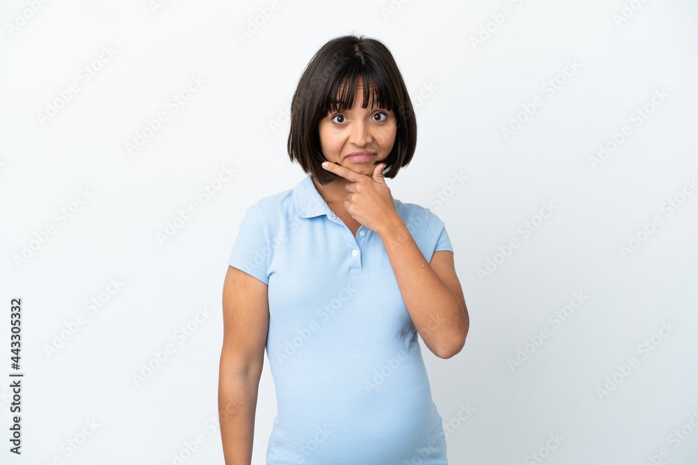 Pregnant woman over isolated white background thinking Pregnant woman over isolated white background thinking