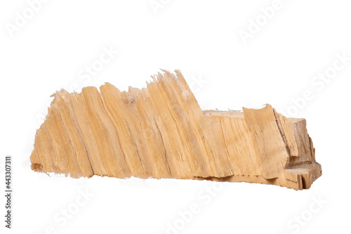 An irregular piece of pine wood. Grain texture in coniferous wood.