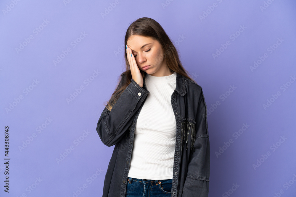 Young Lithuanian woman isolated on purple background with headache Young Lithuanian woman isolated on purple background with headache