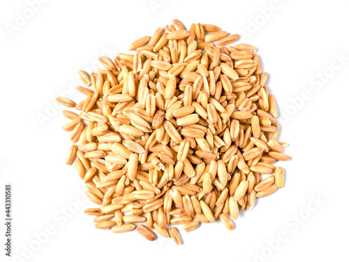 Close-up of a pile of organic oatmeal grains isolated on a white background.
