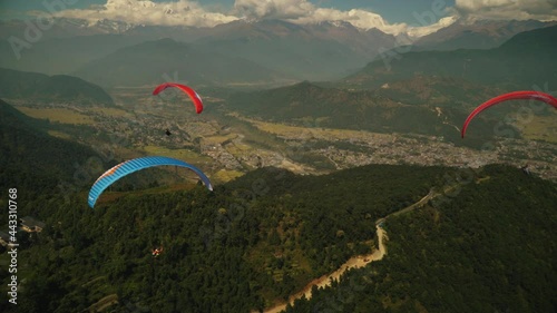 paragliding in the himalayan mountains 