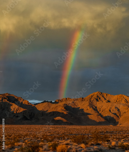 An amazing double rainbow during storm in the desert. 
