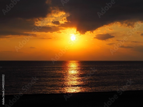 太平洋に沈む夕日 © poteco