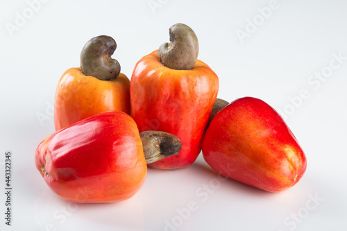 Fresh ripe cashew fruits isolated on white background. photo