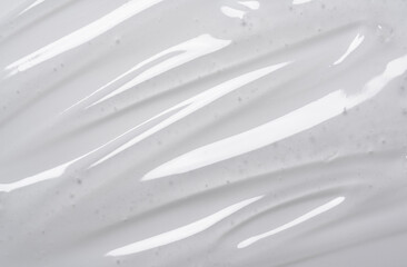 Serum texture on transparent liquid gel background.