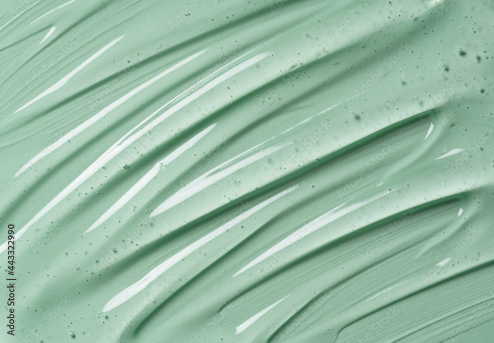 Serum texture on transparent liquid gel background with green ...