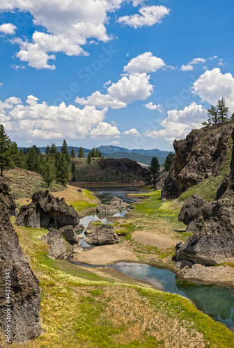 A beautiful cloudy day over a small lake in the wilderness of California. 