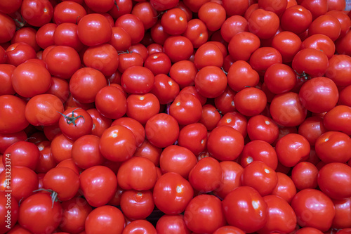 Close up view of tomatoes fruits on shelf of supermarket. Sweden. 