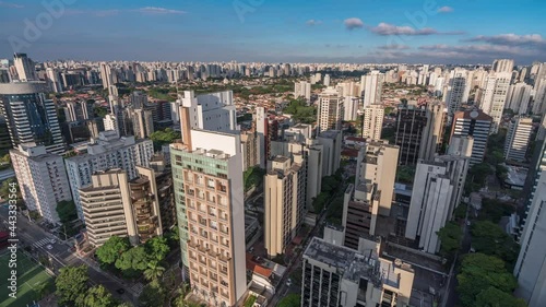 entardecer na zona sul de São Paulo, muitos prédios e nuvens  photo