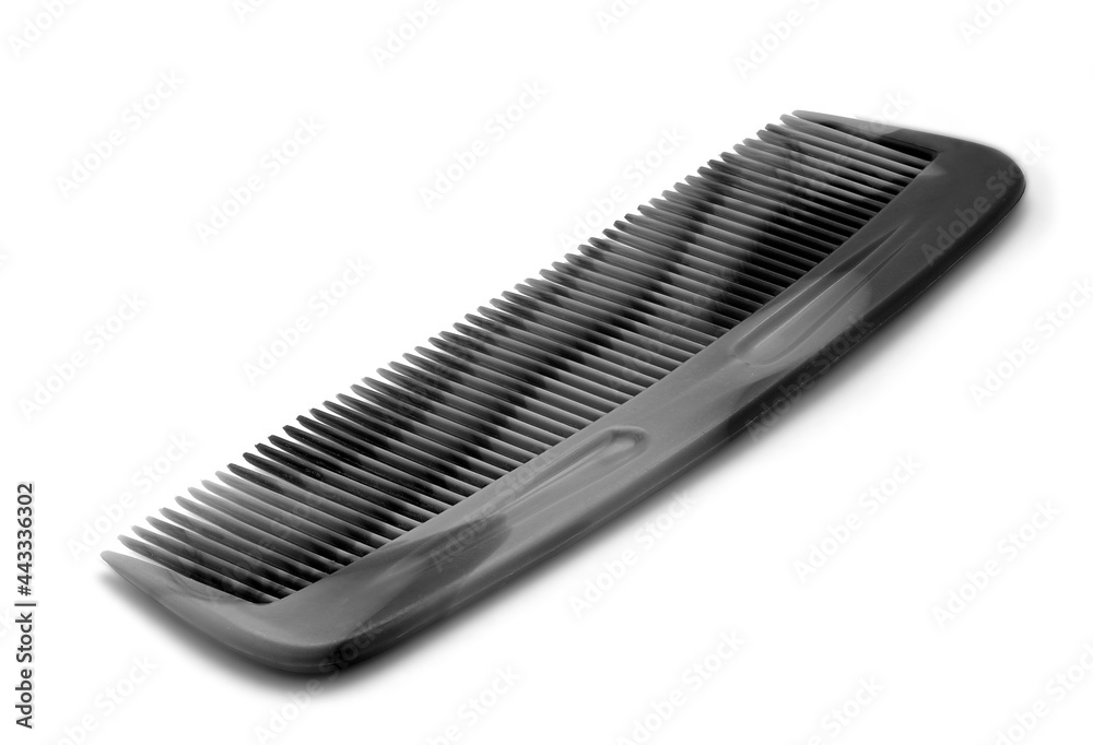 black comb isolated on a white background. Close up black comb isolated on a white background. Close up