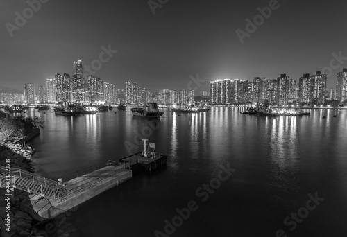 Night scenery of harbor and skyline of Hong Kong city