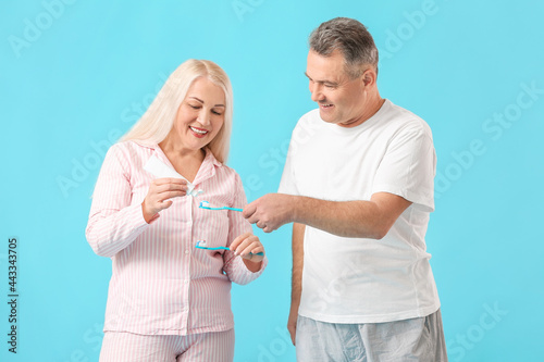 Mature couple brushing teet...