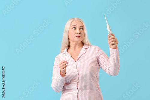 Mature woman with tooth bru...