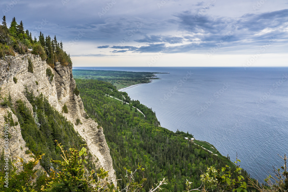 View on the cliffs of Forillon National Park and in the far the Cap des Rosiers from the Mount St Alban hike belvedere (Quebec, Canada)