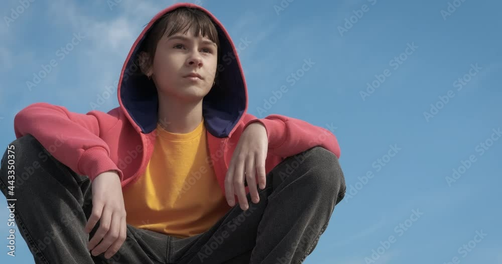 Abandoned child outdoor. A view of abandoned alone teen outdoor. Abandoned child outdoor. A view of abandoned alone teen outdoor.