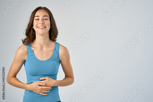 Bilde på lerret cheerful brunette fashion hairstyle blue tank top posing lifestyle fashion yes
