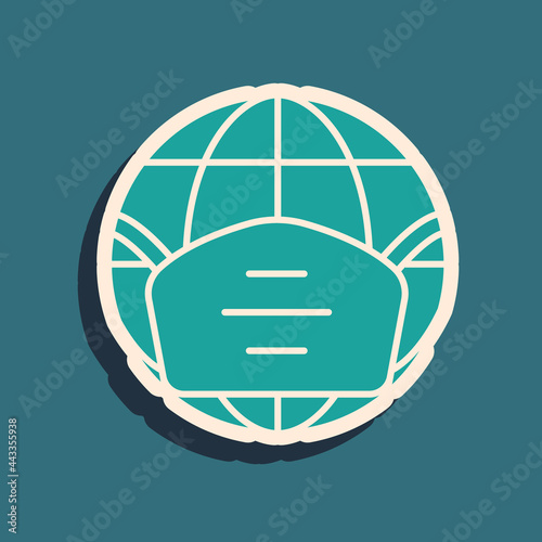 Green Earth globe with medical mask icon isolated on green background. Long shadow style. Vector.