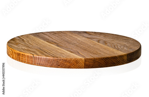 Round shape oak cutting board on white background
