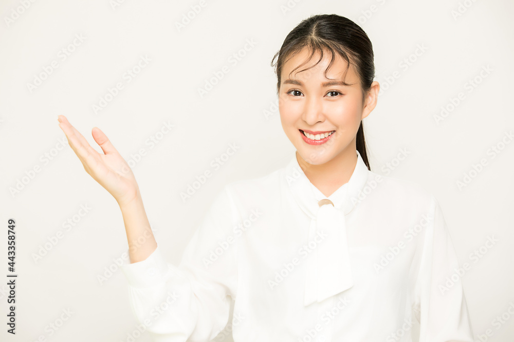 Portrait of pretty female office worker, business woman person showing something with business file material in isolate empty background Portrait of pretty female office worker, business woman person showing something with business file material in isolate empty background