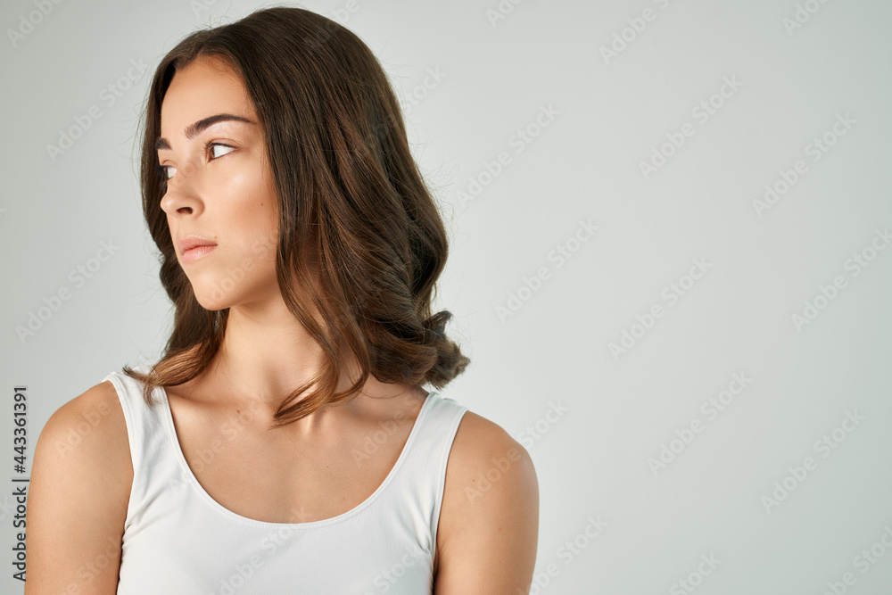 attractive brunette fashion hairstyle white tank top hand gesture emotion attractive brunette fashion hairstyle white tank top hand gesture emotion