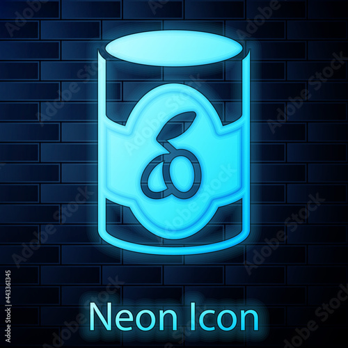 Glowing neon Olives in can icon isolated on brick wall background. Concept of canned food. Vector