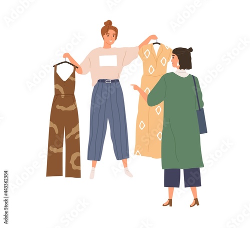 Shop assistant offering choice of trendy fashion clothes to buyer. Woman choosing and buying stylish garment during shopping. Seller and shopper. Flat vector illustration isolated on white background
