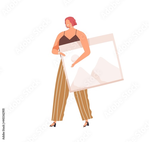 Tiny person holding big framed photo in hands. Artist carrying picture of lan...