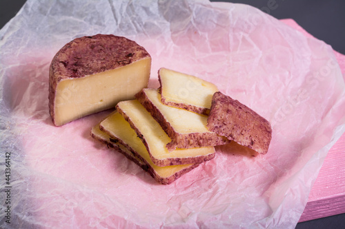 berry cheese suluguni  on white paper grey background