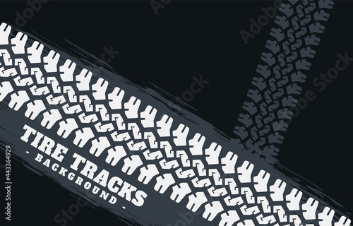 Abstract black background with tire print marks
