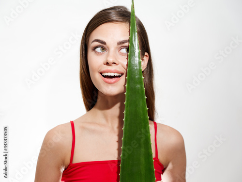 woman clear skin green aloe leaf model naked shoulders
