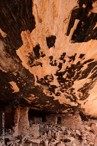 ancient native american cliff dwellings along  the trail to fishmouth cave in  comb ridge, near blanding, utah      photo